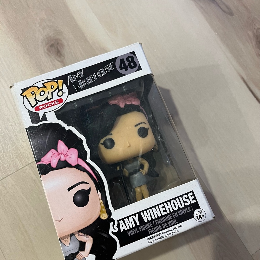 Funko Pop! Rocks Figure with Pink Bow and Black Outfit